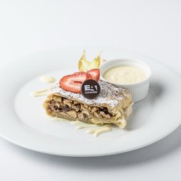 Granny‘s apple strudel with nuts and vanilla sauce